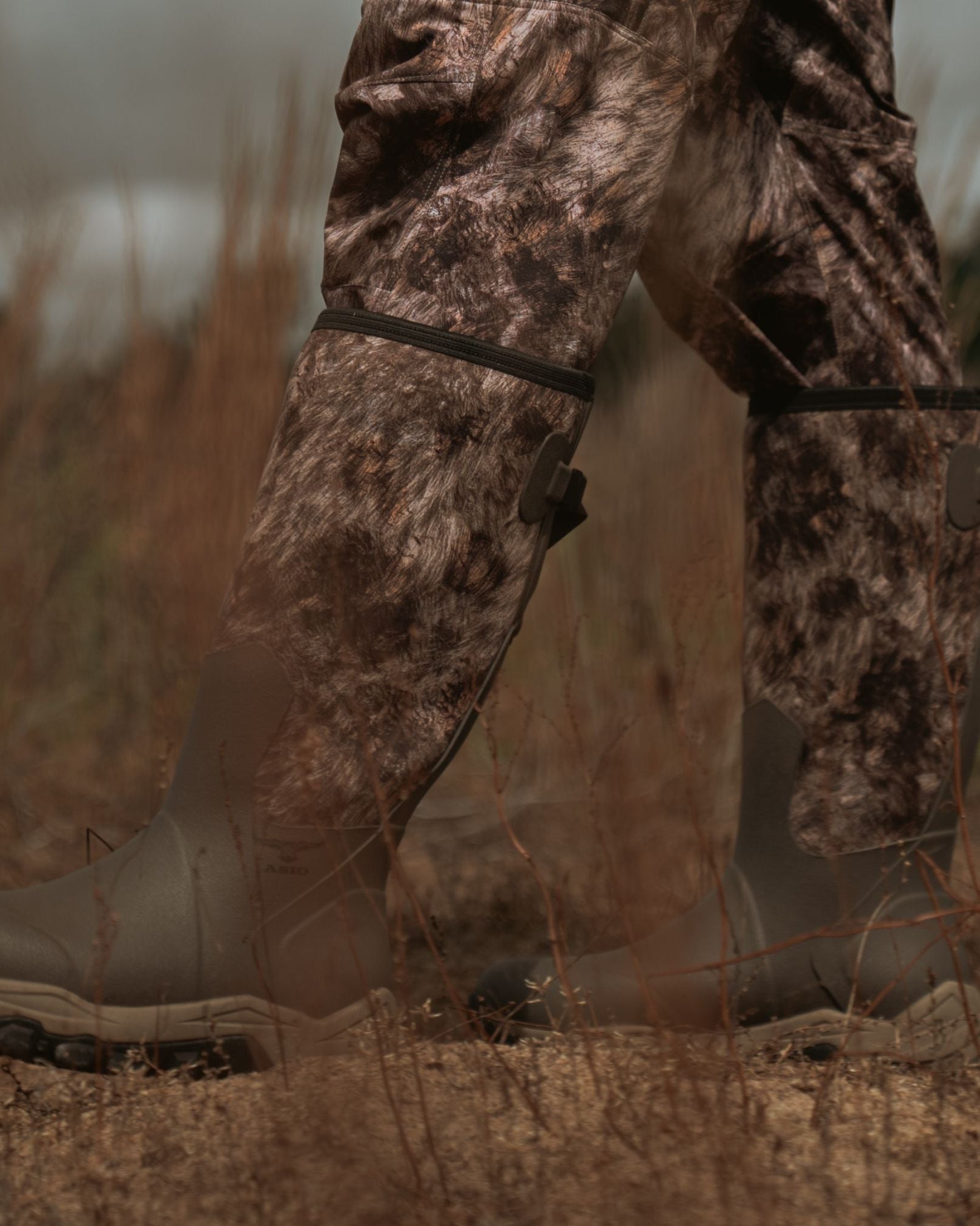 showcasing the new asio gear rapx camo boots in a western plain