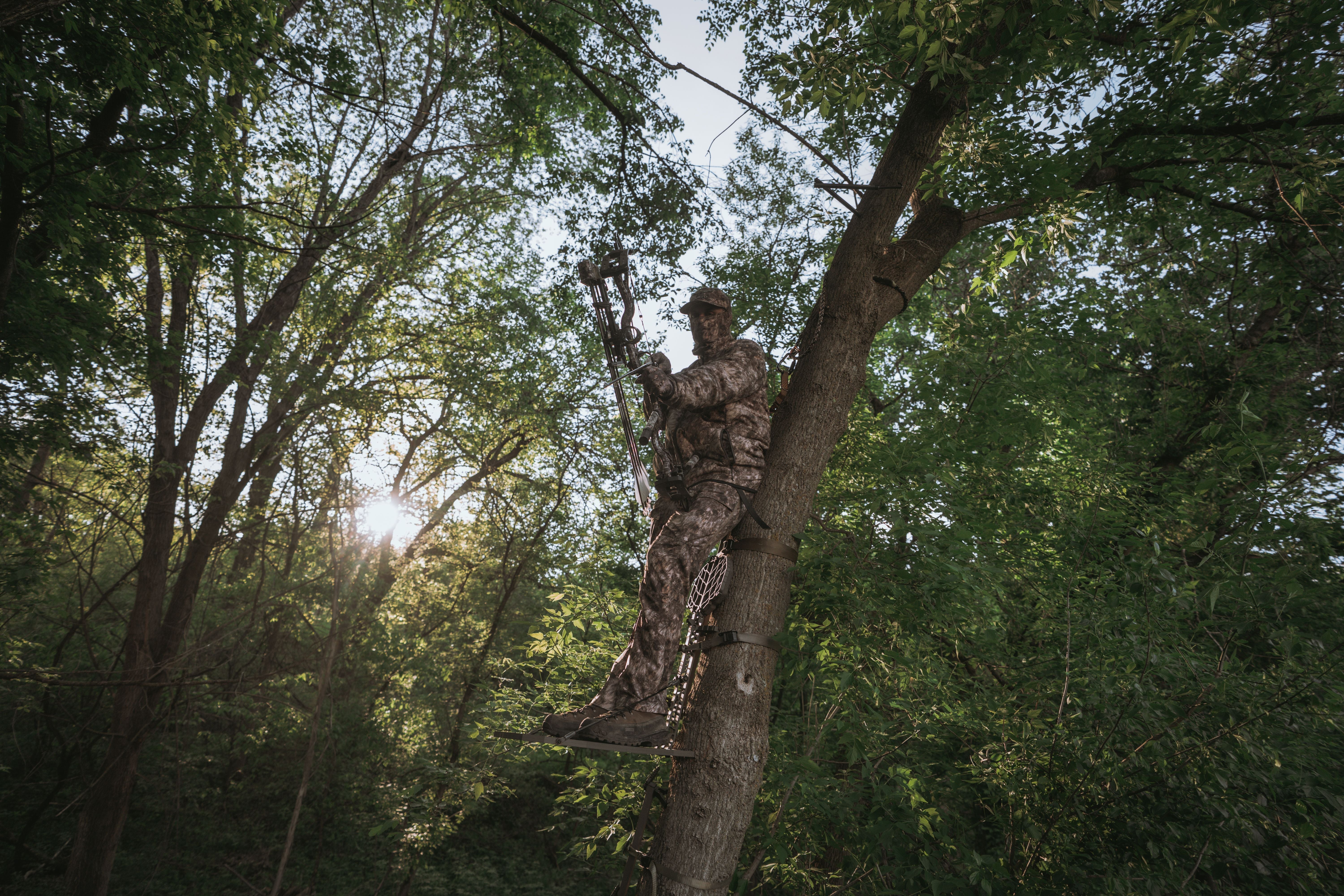 hunter wearing asio gear rapx camo during an afternoon early season bowhunt